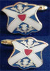 Enamelled Cufflinks of the Society's arms.